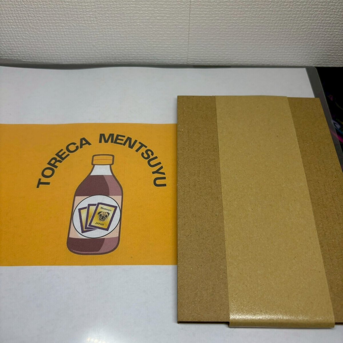 発送用の箱に入れて封かん